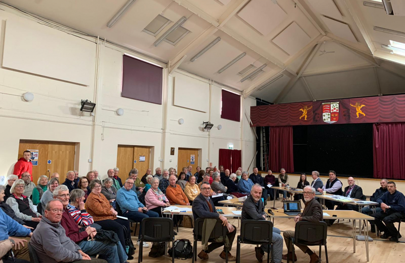 Bernard at Langham Parish Council surrounded by residents