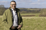 Bernard standing in a field