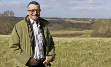 Bernard standing in a field